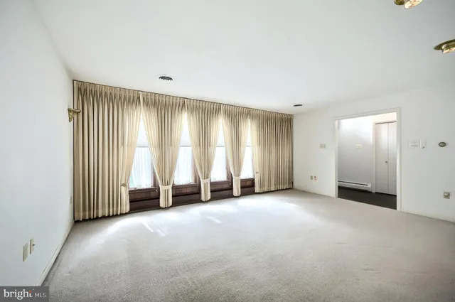 an empty room with windows