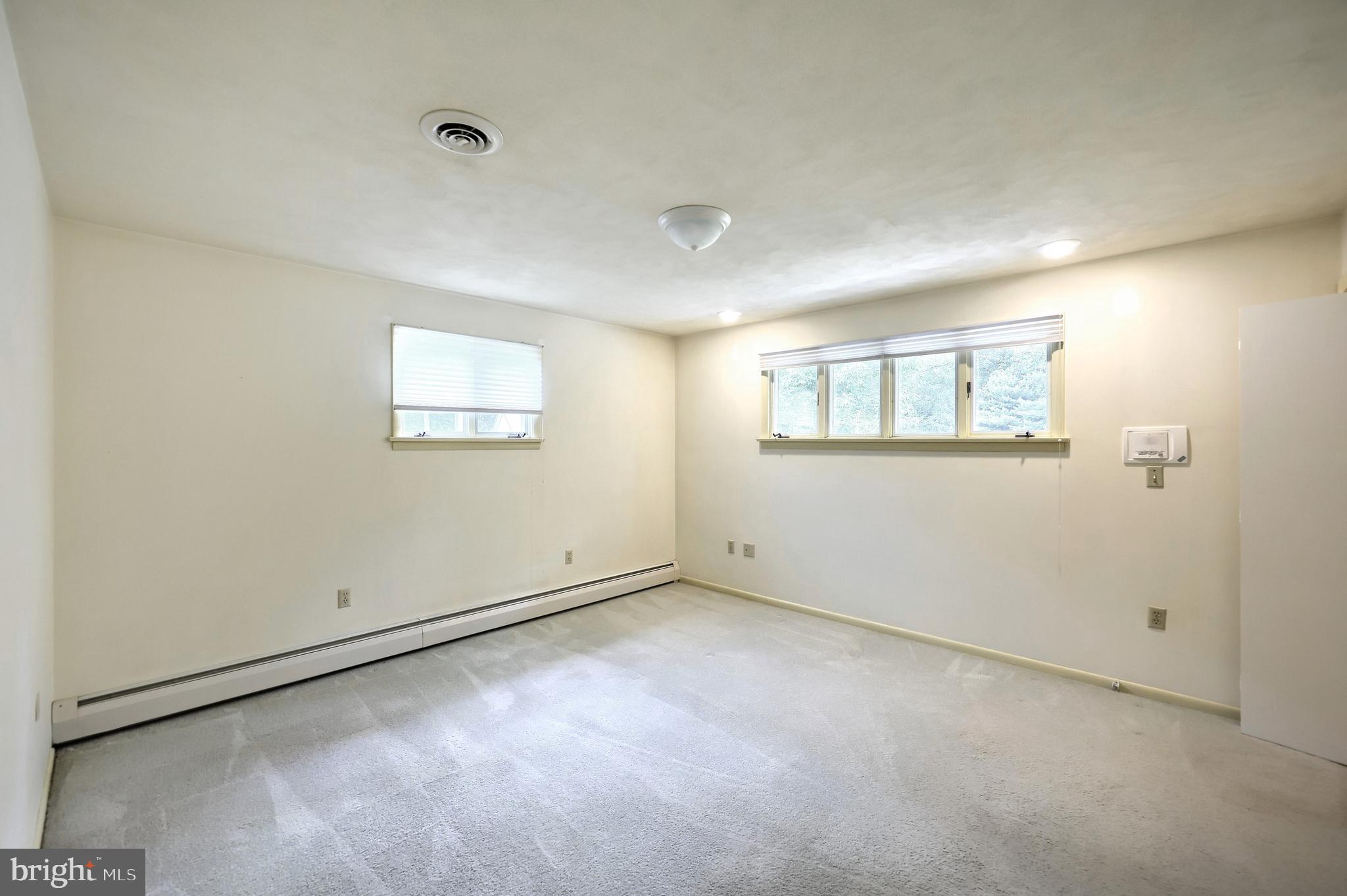 1063 Porters Road Spring Grove, PA 17362 - Photo 31 of 56 an empty room with windows