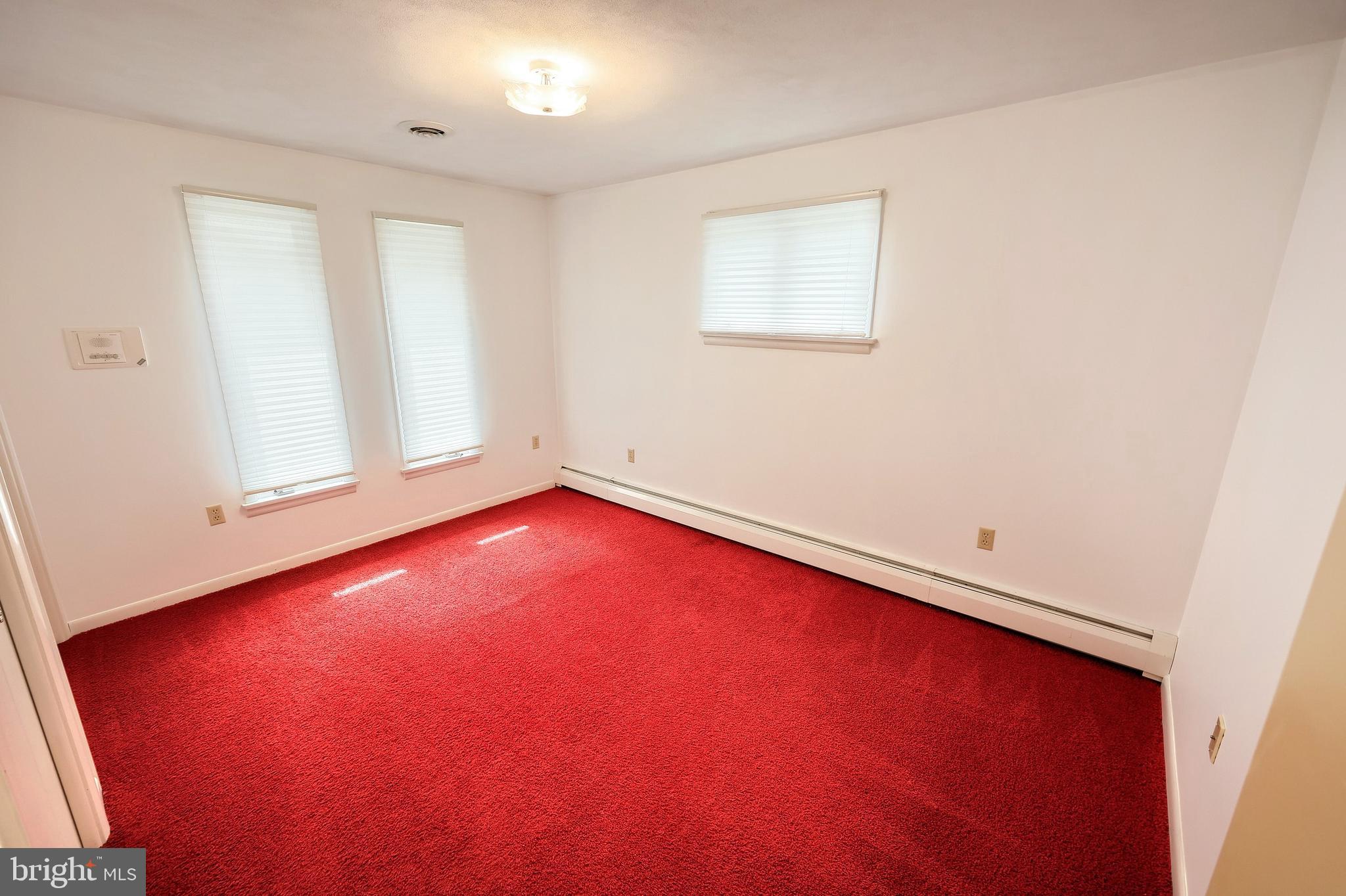 1063 Porters Road Spring Grove, PA 17362 - Photo 34 of 56 an empty room with windows and entrance