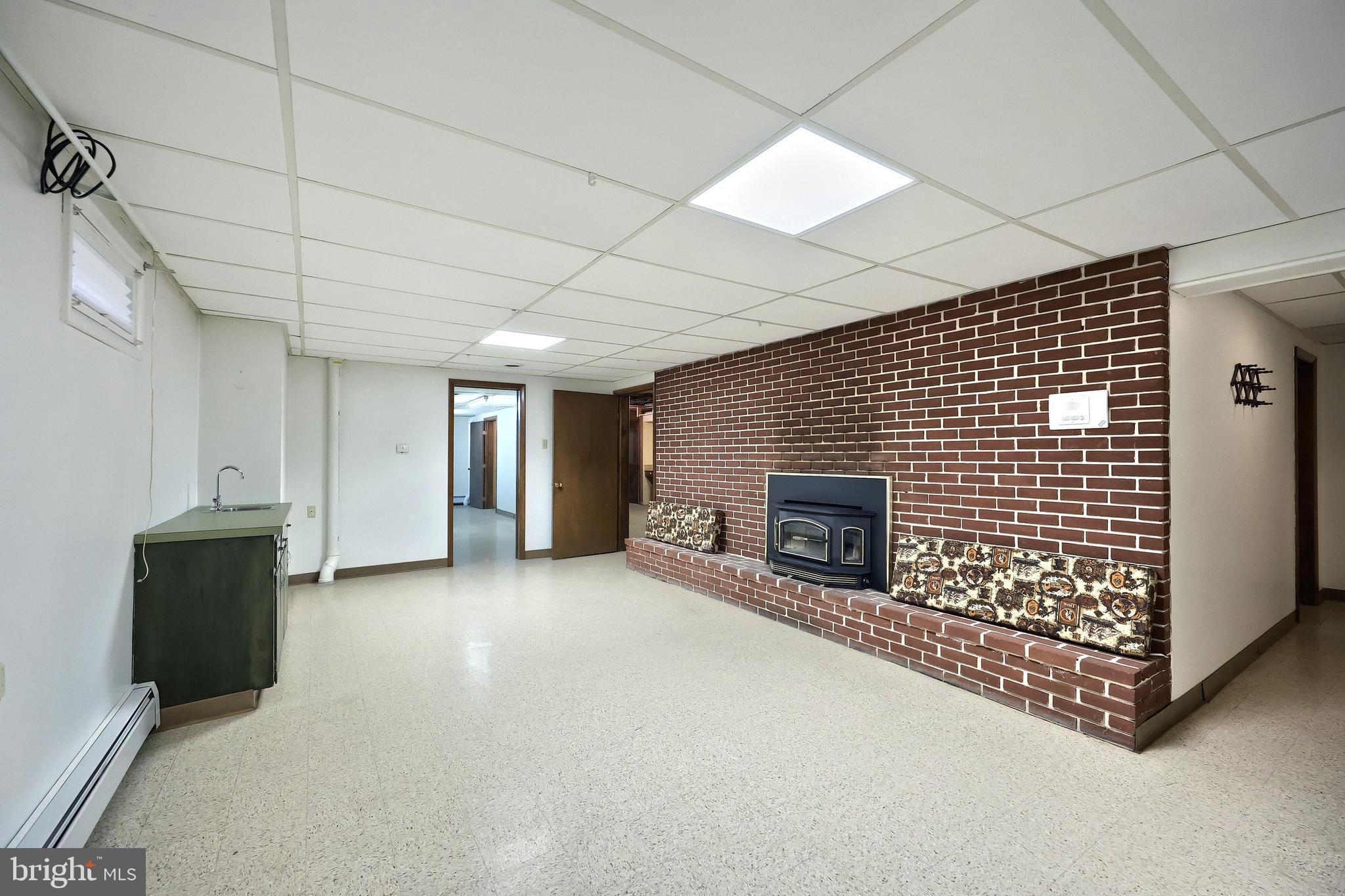 1063 Porters Road Spring Grove, PA 17362 - Photo 38 of 56 a view of an empty room with a fireplace