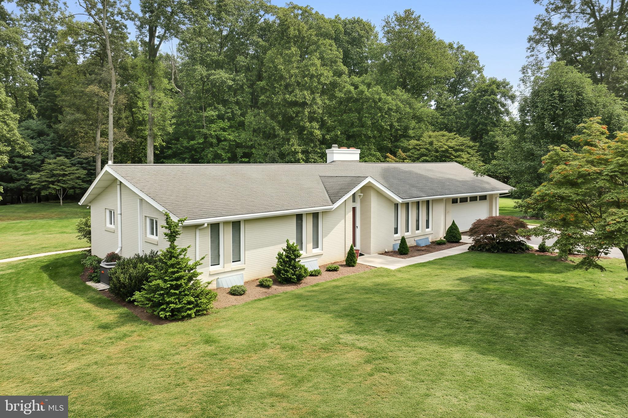 1063 Porters Road Spring Grove, PA 17362 - Photo 4 of 56 a front view of a house with garden