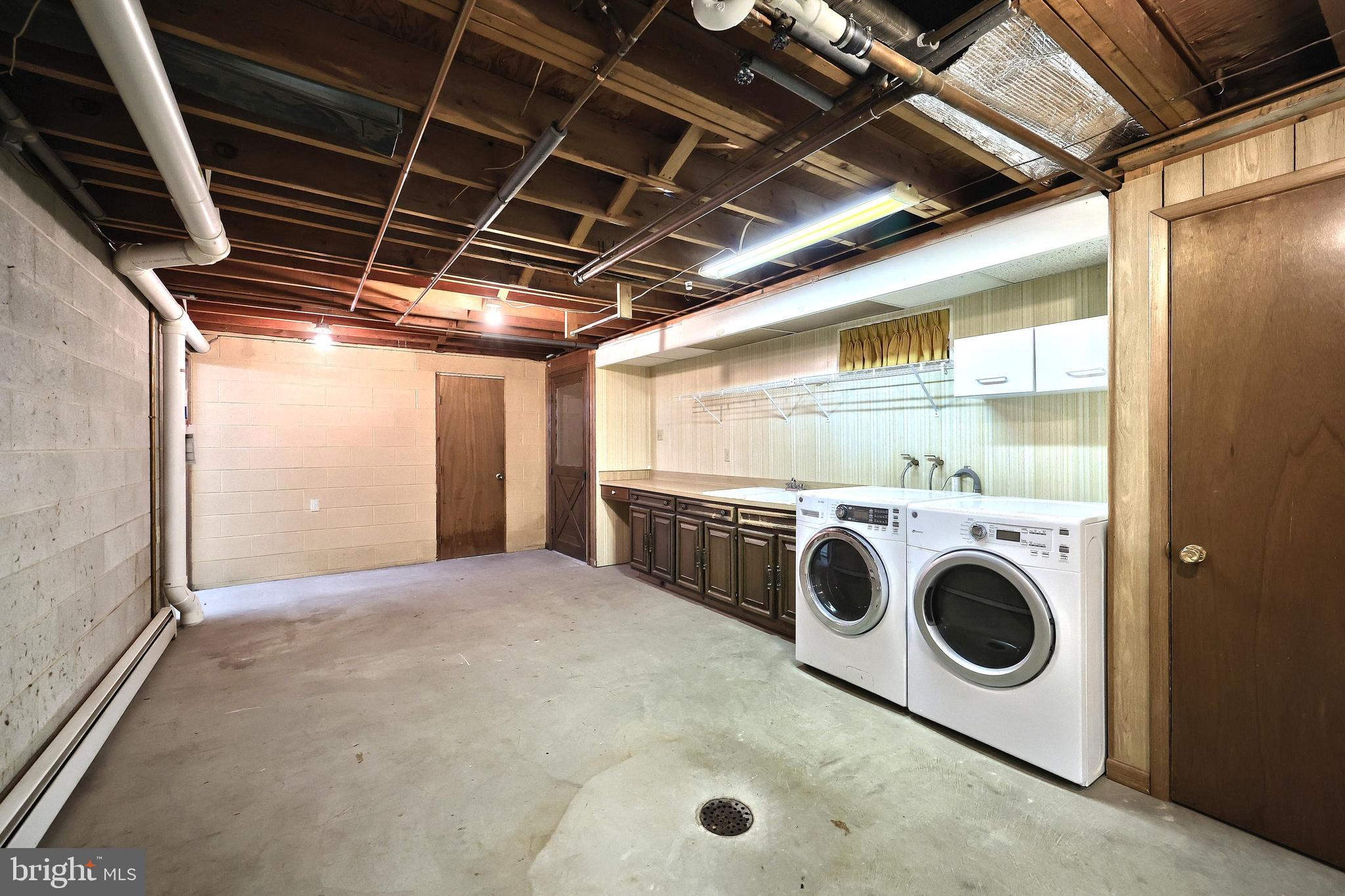 1063 Porters Road Spring Grove, PA 17362 - Photo 41 of 56 a utility room with dryer and washer