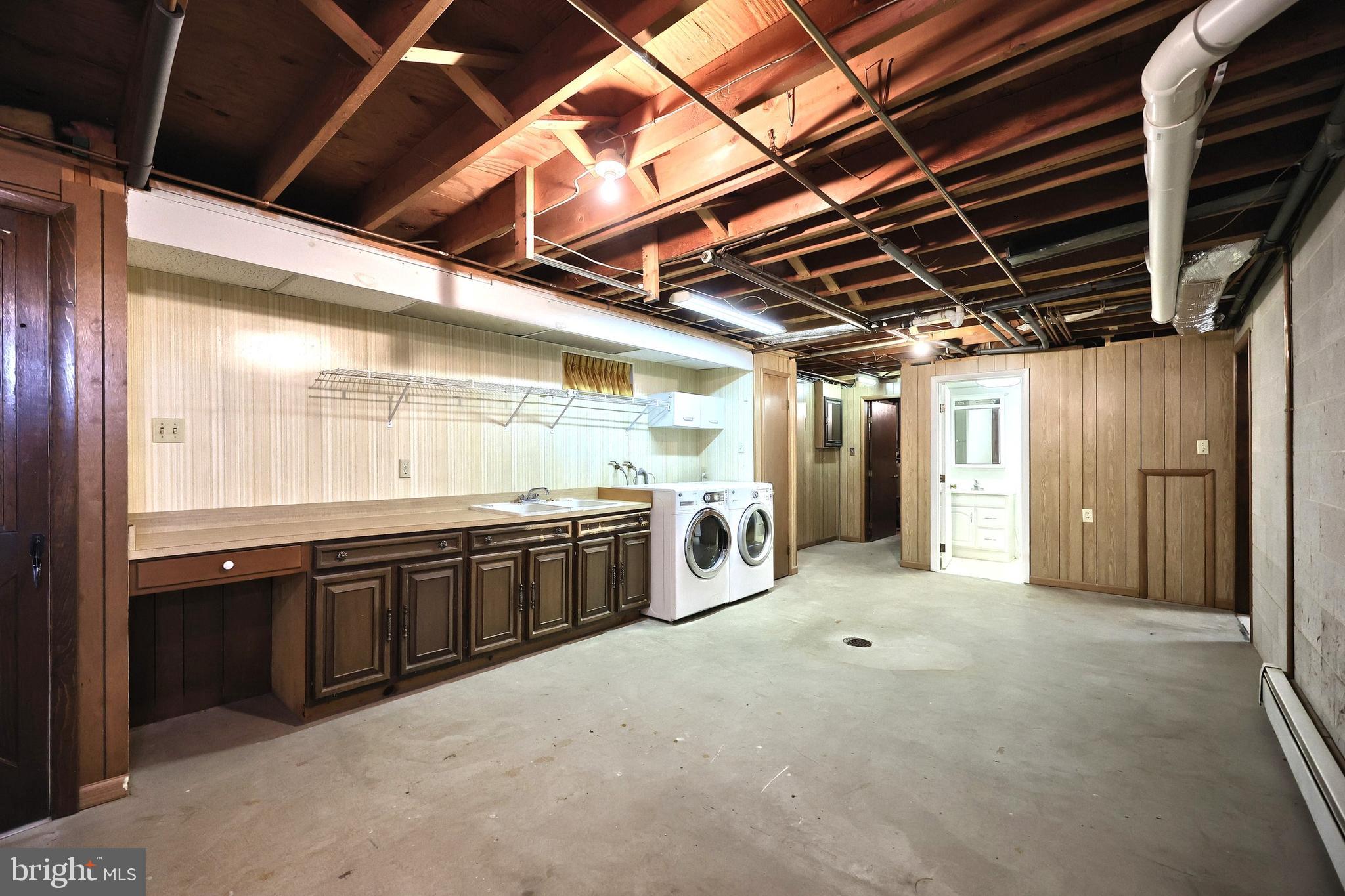 1063 Porters Road Spring Grove, PA 17362 - Photo 42 of 56 a large kitchen with stainless steel appliances granite countertop a stove and a shower