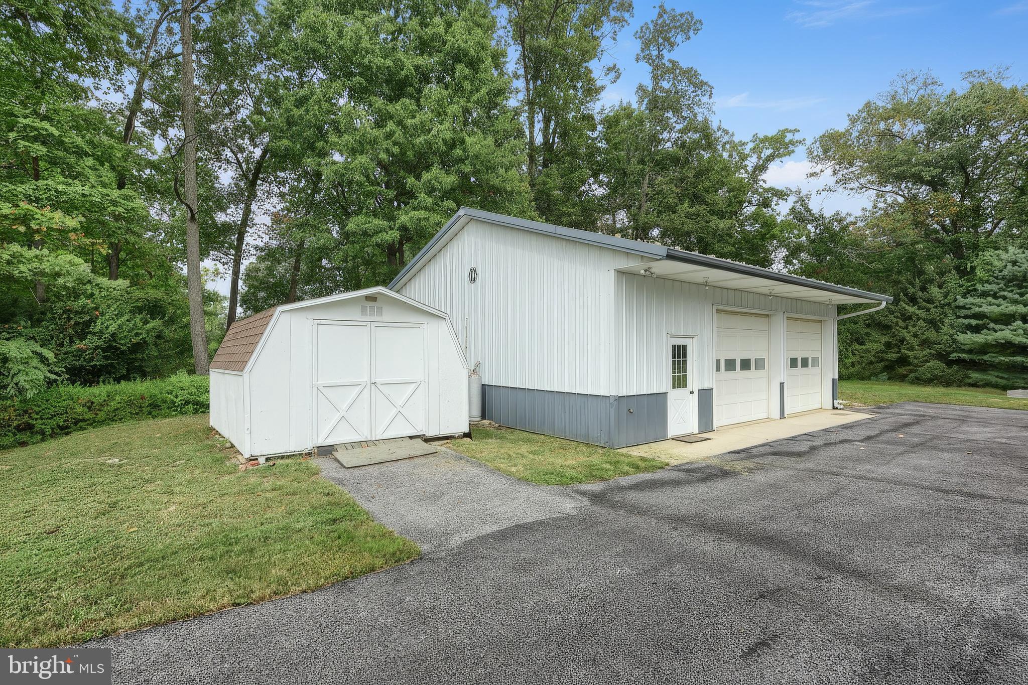 1063 Porters Road Spring Grove, PA 17362 - Photo 46 of 56 a view of a house with a yard and large tree