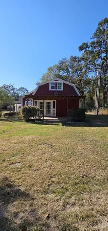 a view of a house with a ocean view