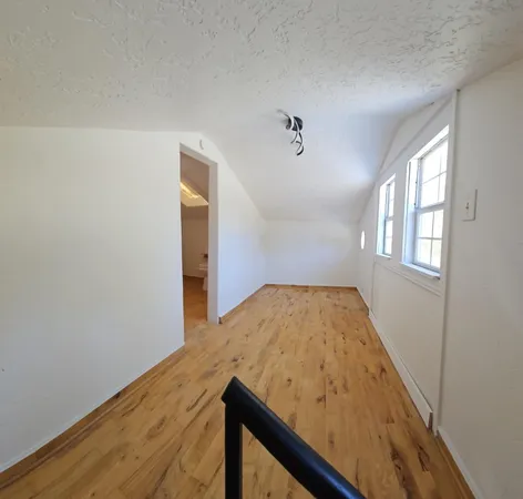 a bathroom with a sink a toilet and bathtub