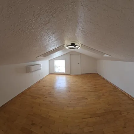 a bathroom with a toilet and a sink