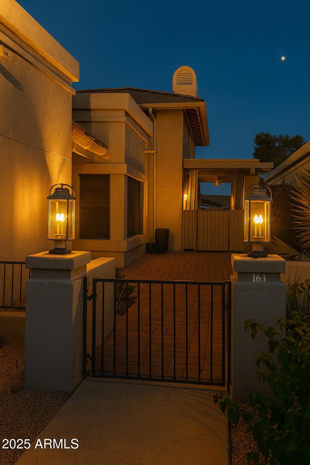 8100 East Camelback Road, Unit 163 Scottsdale, AZ 85251 - Photo 2 of 51 a view of a house with many windows