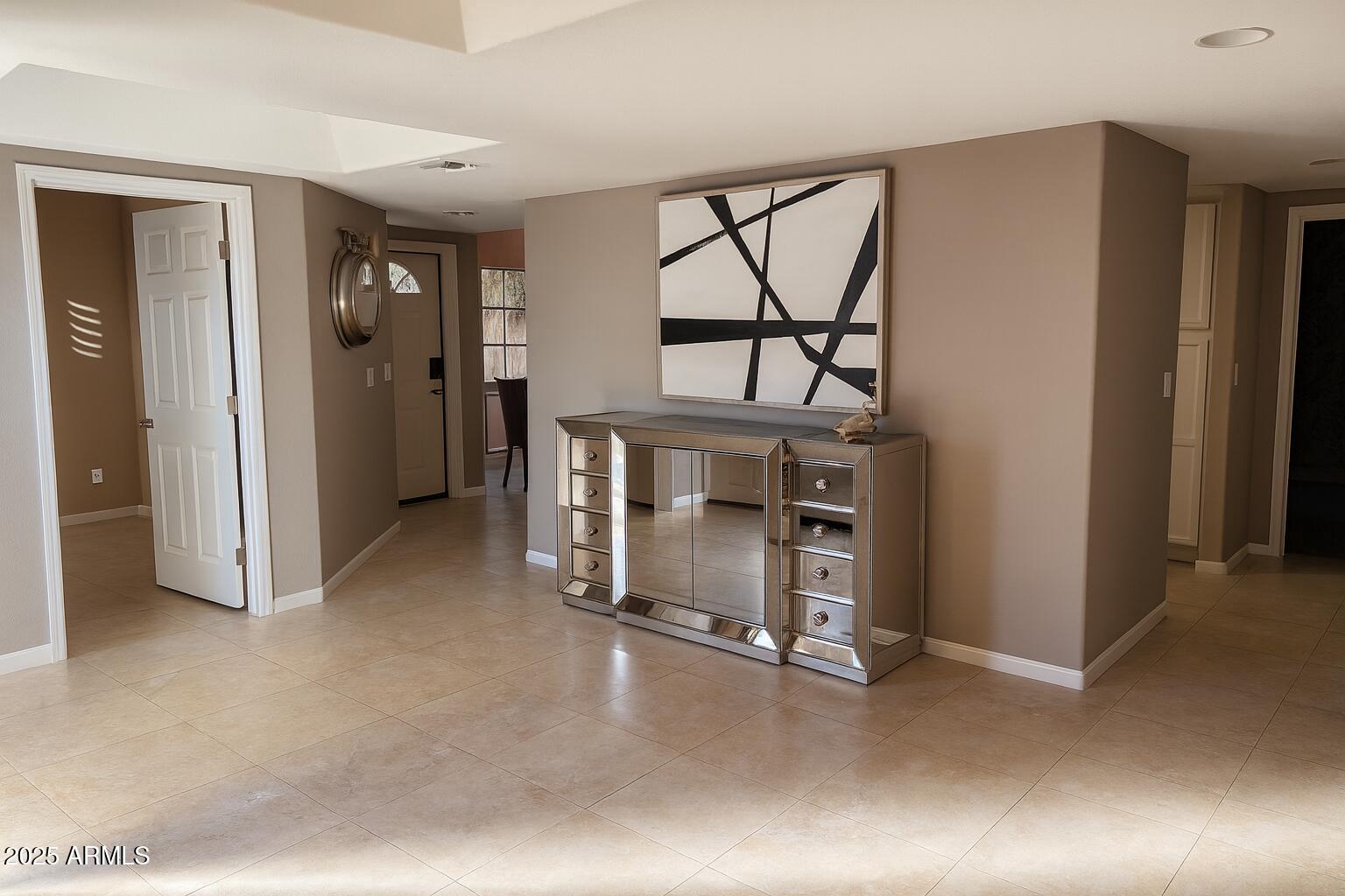 8100 East Camelback Road, Unit 163 Scottsdale, AZ 85251 - Photo 4 of 51 a view of a hallway with seating area