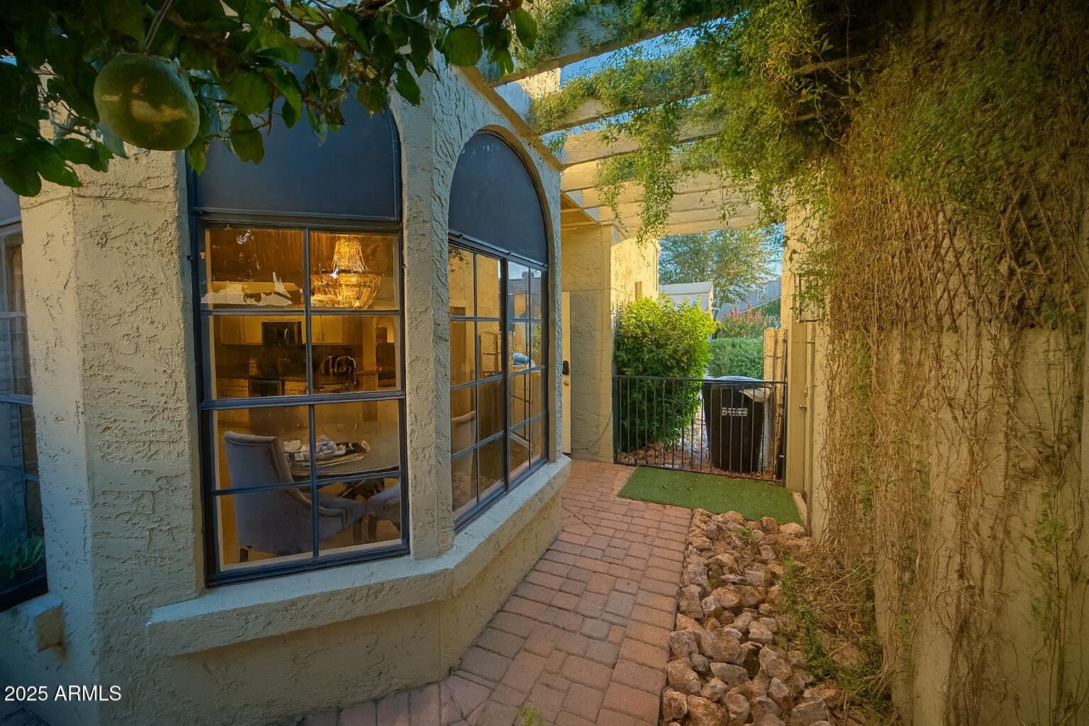 8100 East Camelback Road, Unit 163 Scottsdale, AZ 85251 - Photo 43 of 51 a view of a glass door with a glass door