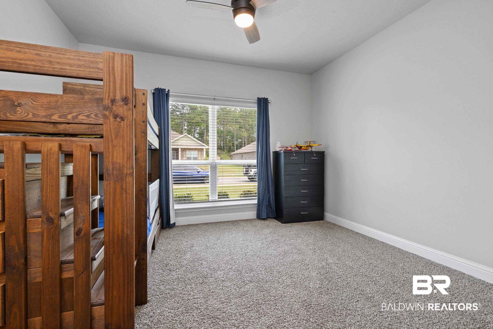 2183 Meadowview Loop Semmes, AL 36575 - Photo 15 of 58 Carpeted bedroom featuring baseboards and ceiling fan