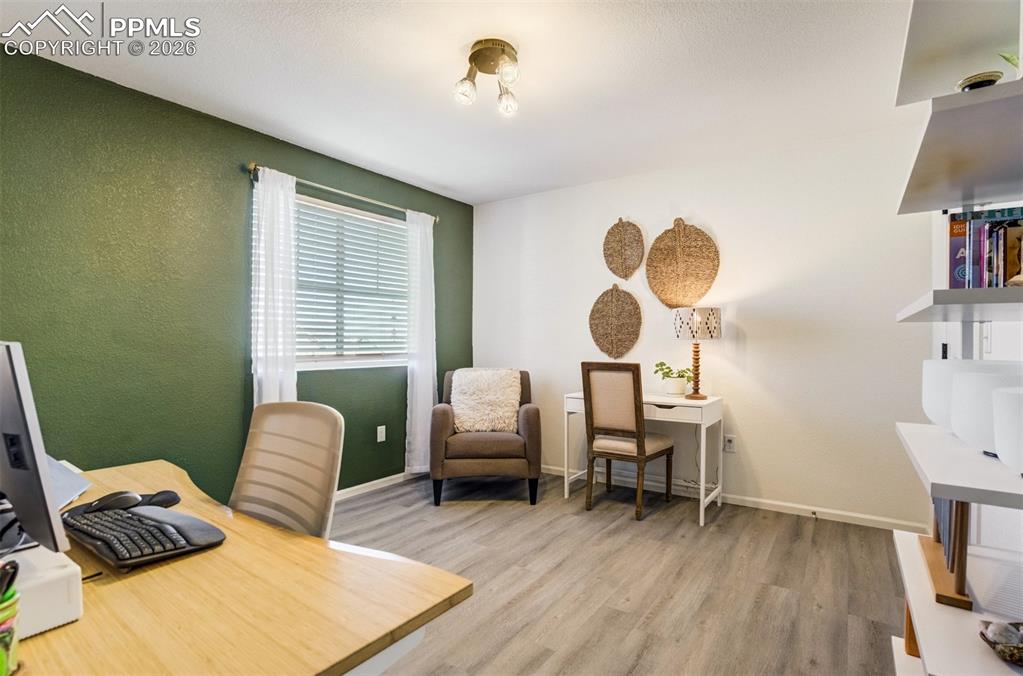 6374 Moate Lane Colorado Springs, CO 80927 - Photo 23 of 42 a bedroom with furniture and a window