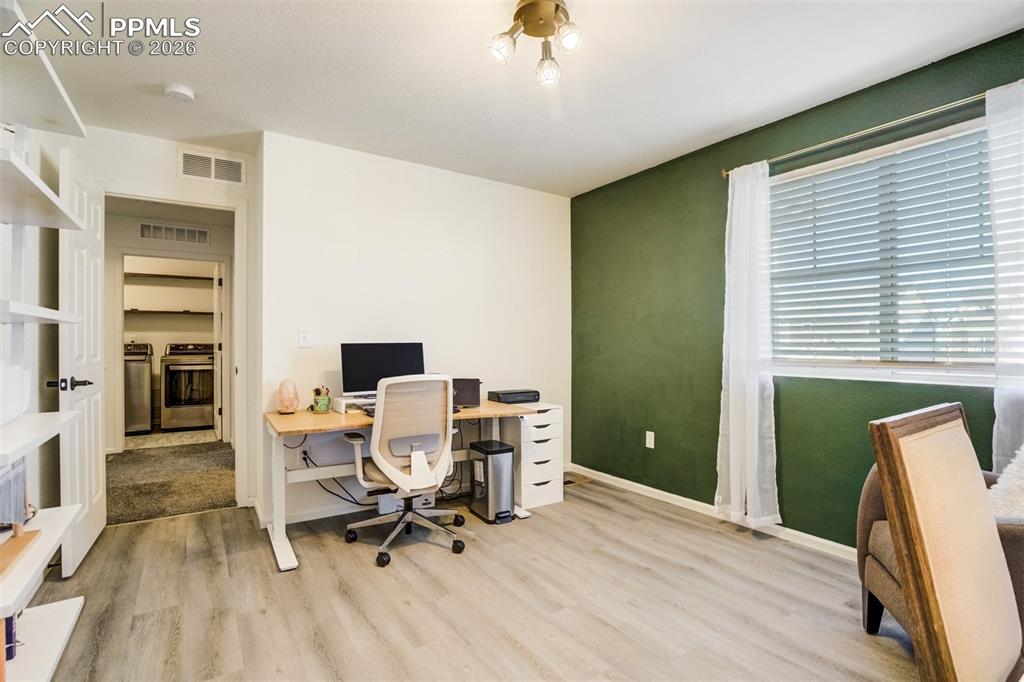 6374 Moate Lane Colorado Springs, CO 80927 - Photo 25 of 42 a workspace with furniture and a window