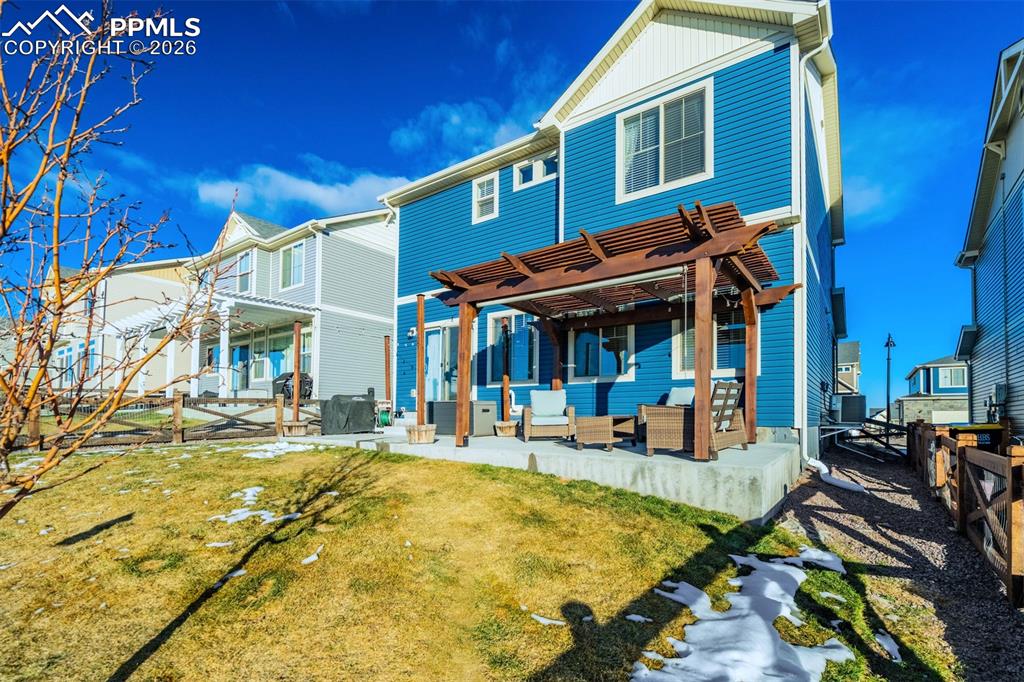 6374 Moate Lane Colorado Springs, CO 80927 - Photo 38 of 42 a view of a building with sitting area