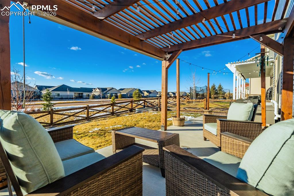 6374 Moate Lane Colorado Springs, CO 80927 - Photo 39 of 42 a view of a swimming pool with seating area