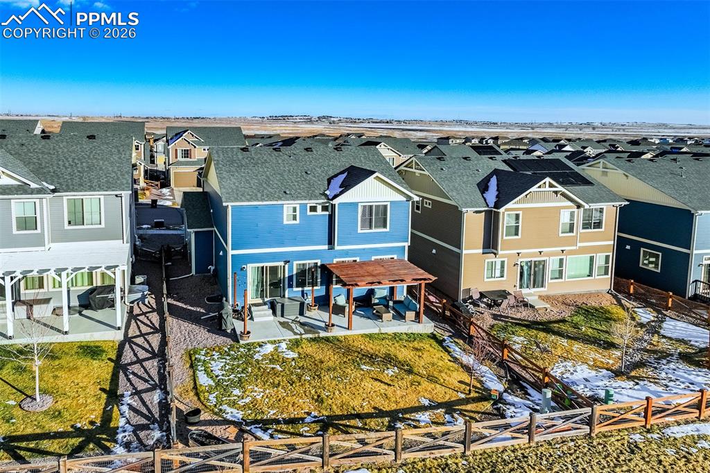 6374 Moate Lane Colorado Springs, CO 80927 - Photo 41 of 42 an aerial view of a house with swimming pool and large trees