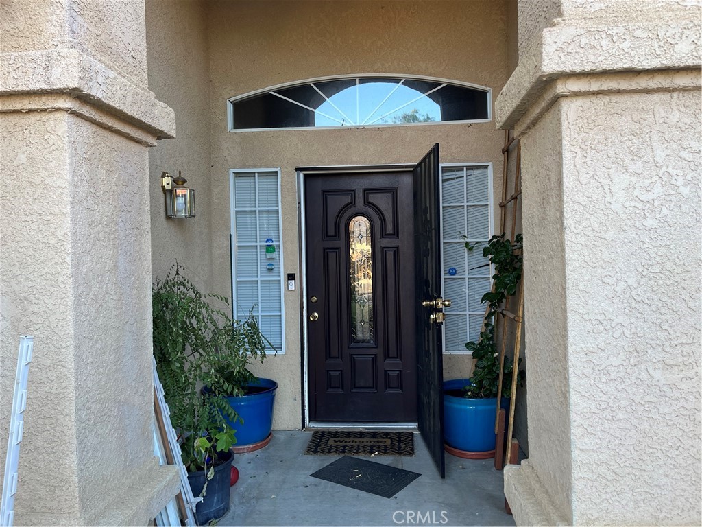 740 Hazelhurst Way Coalinga, CA 93210 - Photo 16 of 19 a front view of a house with garden