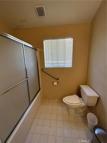 a bathroom with a toilet
