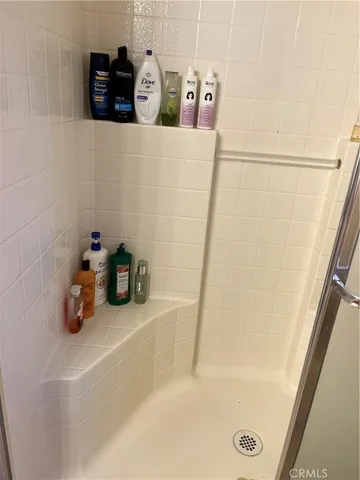 a bathroom with a tub and sink