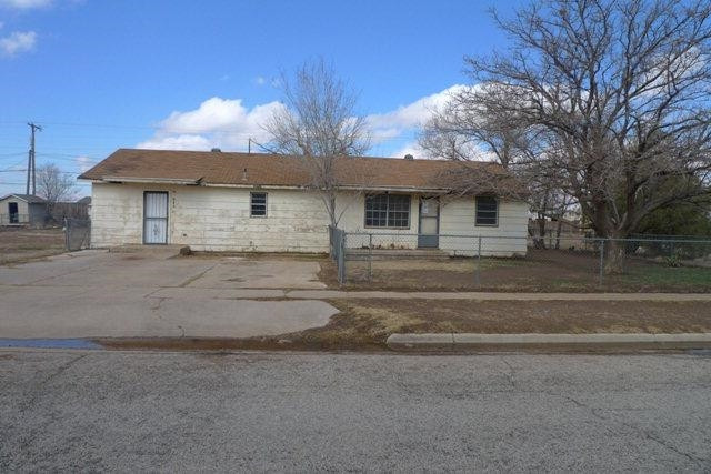 513 East Tulane Street Lubbock, TX 79403 - Photo 1 of 10 a front view of a house with a yard and garage