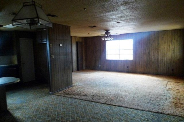 513 East Tulane Street Lubbock, TX 79403 - Photo 8 of 10 an empty room with windows