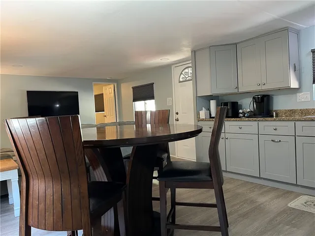 a living room with a couch and a flat screen tv