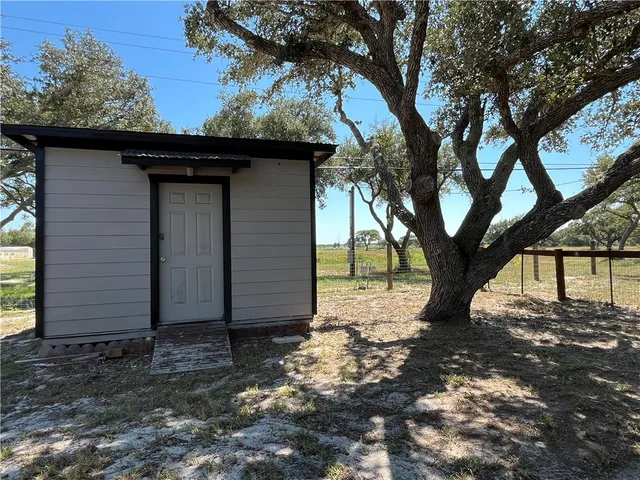 a view of swimming pool with outdoor seating