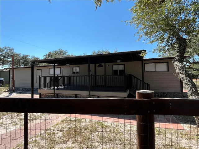 a view of swimming pool with outdoor seating