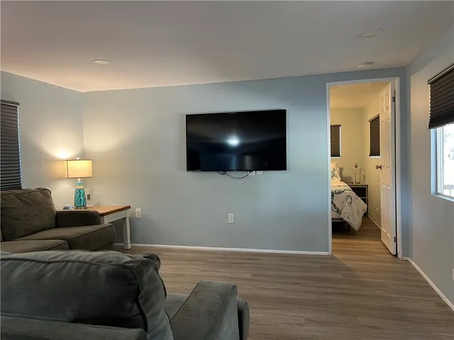 a bedroom with a bed and a table