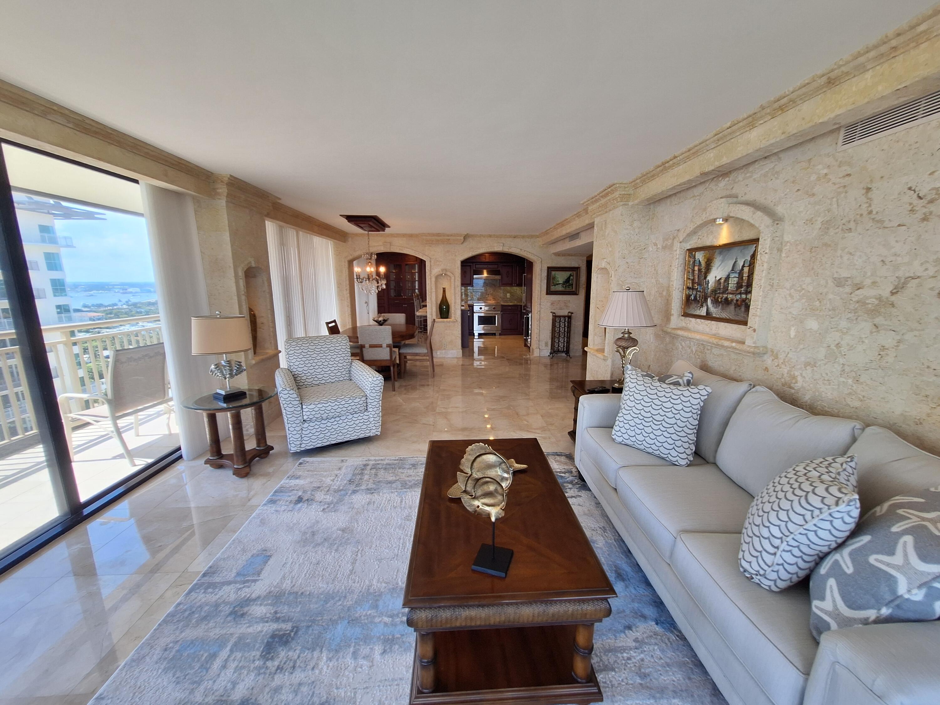 3400 North Ocean Drive, Unit PH2 Singer Island, FL 33404 - Photo 28 of 38 a living room with furniture and large window