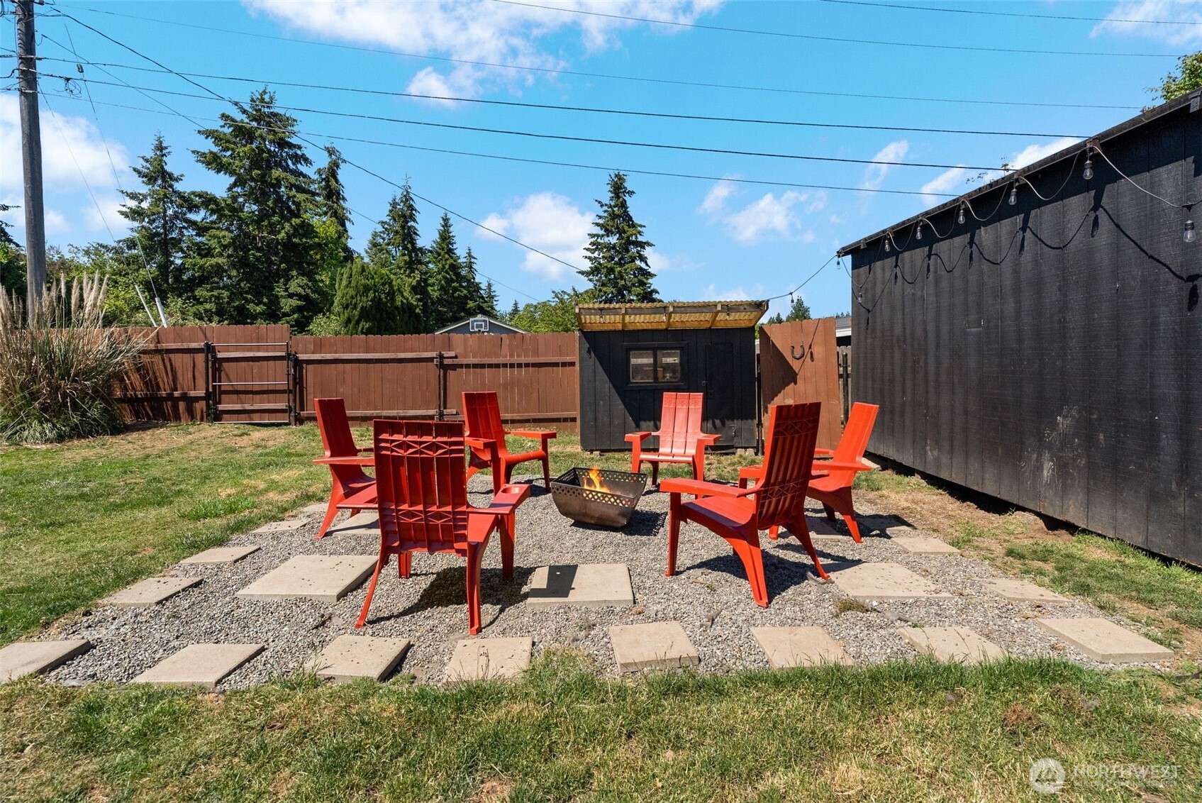 2710 Holman Street Bremerton, WA 98310 - Photo 20 of 25 a view of a backyard with sitting area