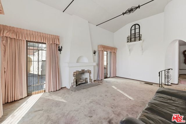 a view of a livingroom with a fireplace