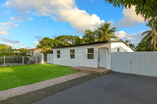 a house view with a garden space