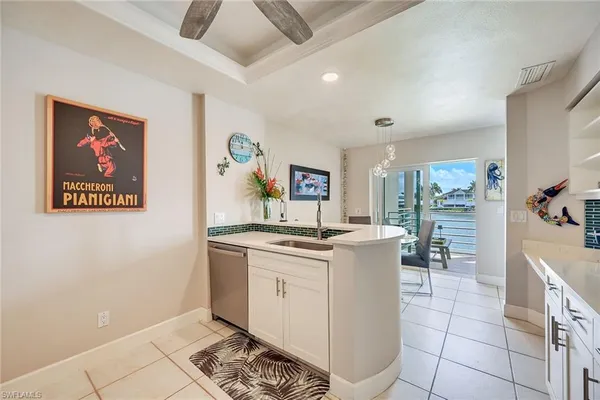 a kitchen with a stove and cabinets