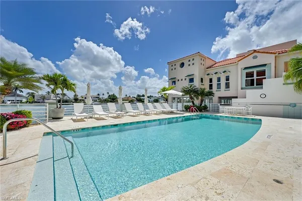 a view of a house with a swimming pool
