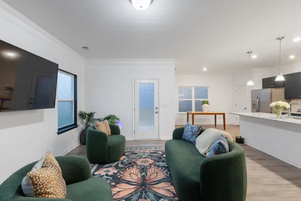 a living room with furniture and a couch