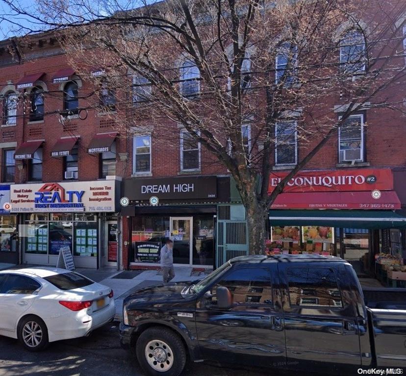 3434 Fulton Street Brooklyn, NY 11208 - Photo 2 of 11 a front view of a building with parking space