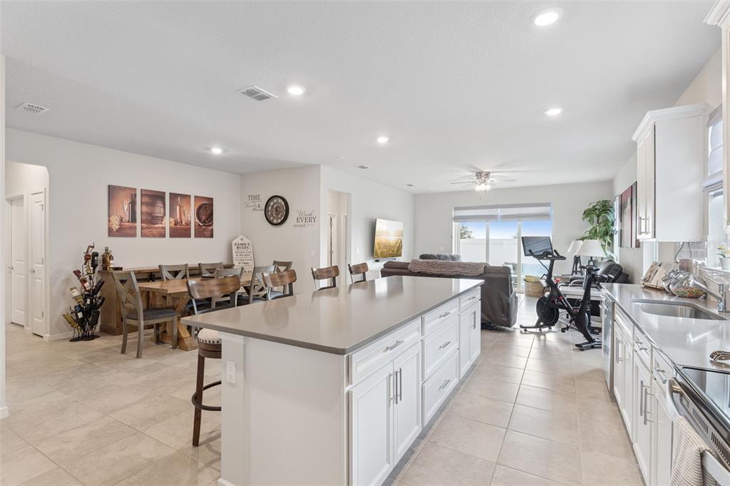 1989 Spring Shower Circle Kissimmee, FL 34744 - Photo 18 of 63 a large kitchen with lots of counter space