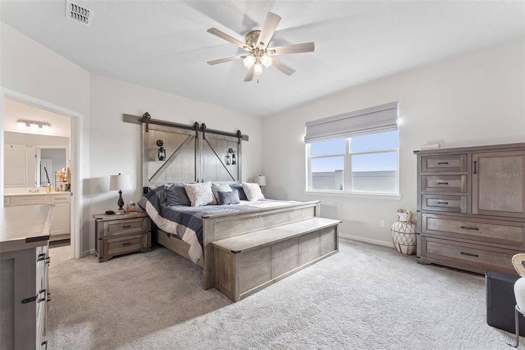 1989 Spring Shower Circle Kissimmee, FL 34744 - Photo 20 of 63 a living room with furniture and a window