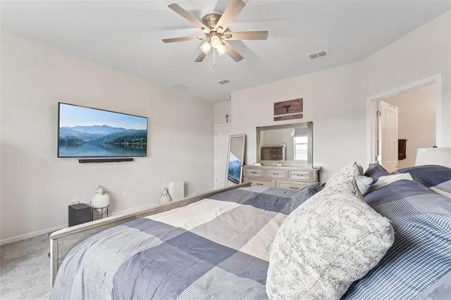 a bathroom with a sink vanity granite and a mirror