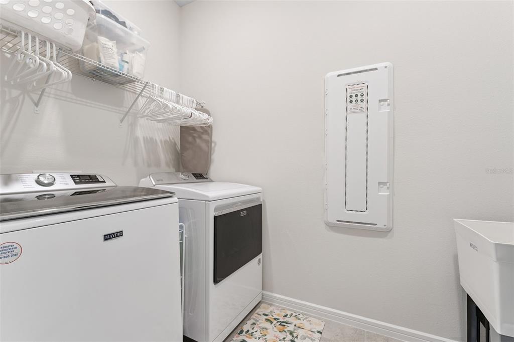 1989 Spring Shower Circle Kissimmee, FL 34744 - Photo 32 of 63 a utility room with dryer and washer