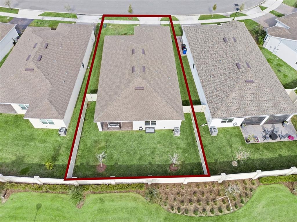 1989 Spring Shower Circle Kissimmee, FL 34744 - Photo 40 of 63 an aerial view of a house with a yard