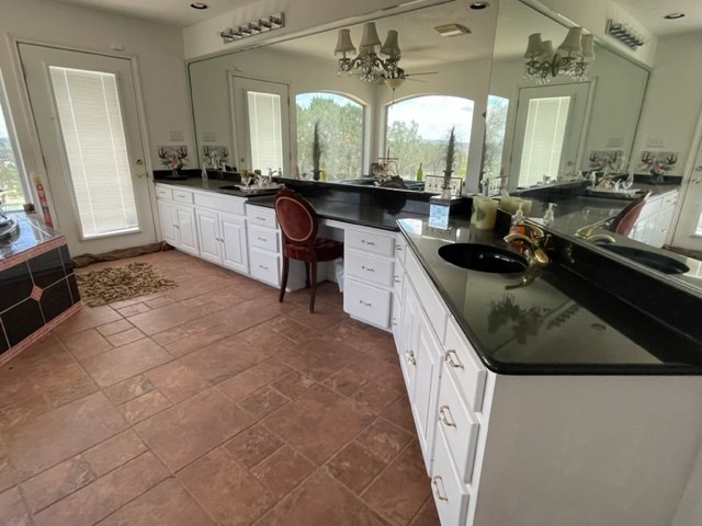 251 East Ranch Road 2169 Junction, TX 76849 - Photo 20 of 43 a kitchen with a sink stove and cabinets
