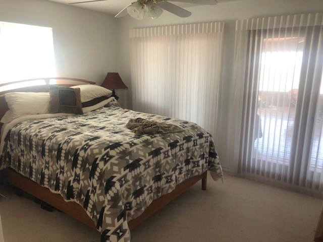 251 East Ranch Road 2169 Junction, TX 76849 - Photo 23 of 43 a bed sitting in a bedroom next to a window