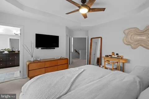 a room with a table and a mirror