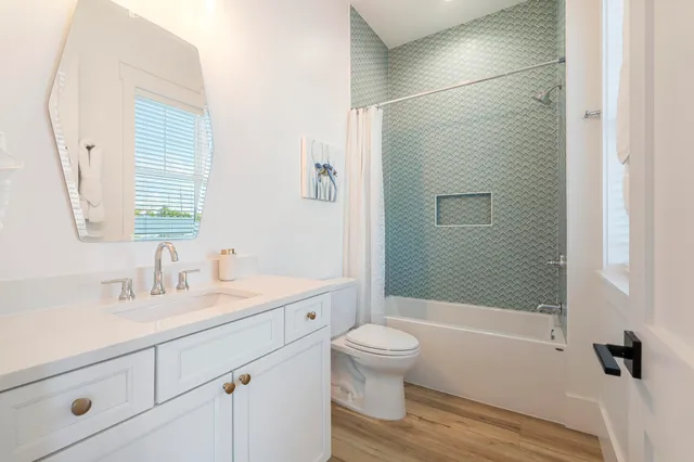 a bed room with a bed and a window