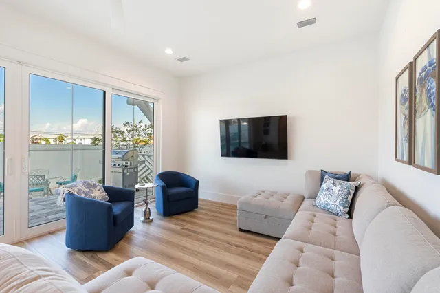 a living room with furniture and a couch