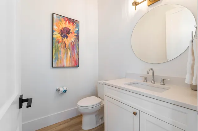 a spacious bedroom with a bed and a large window