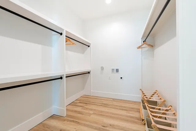 a view of a balcony with chairs