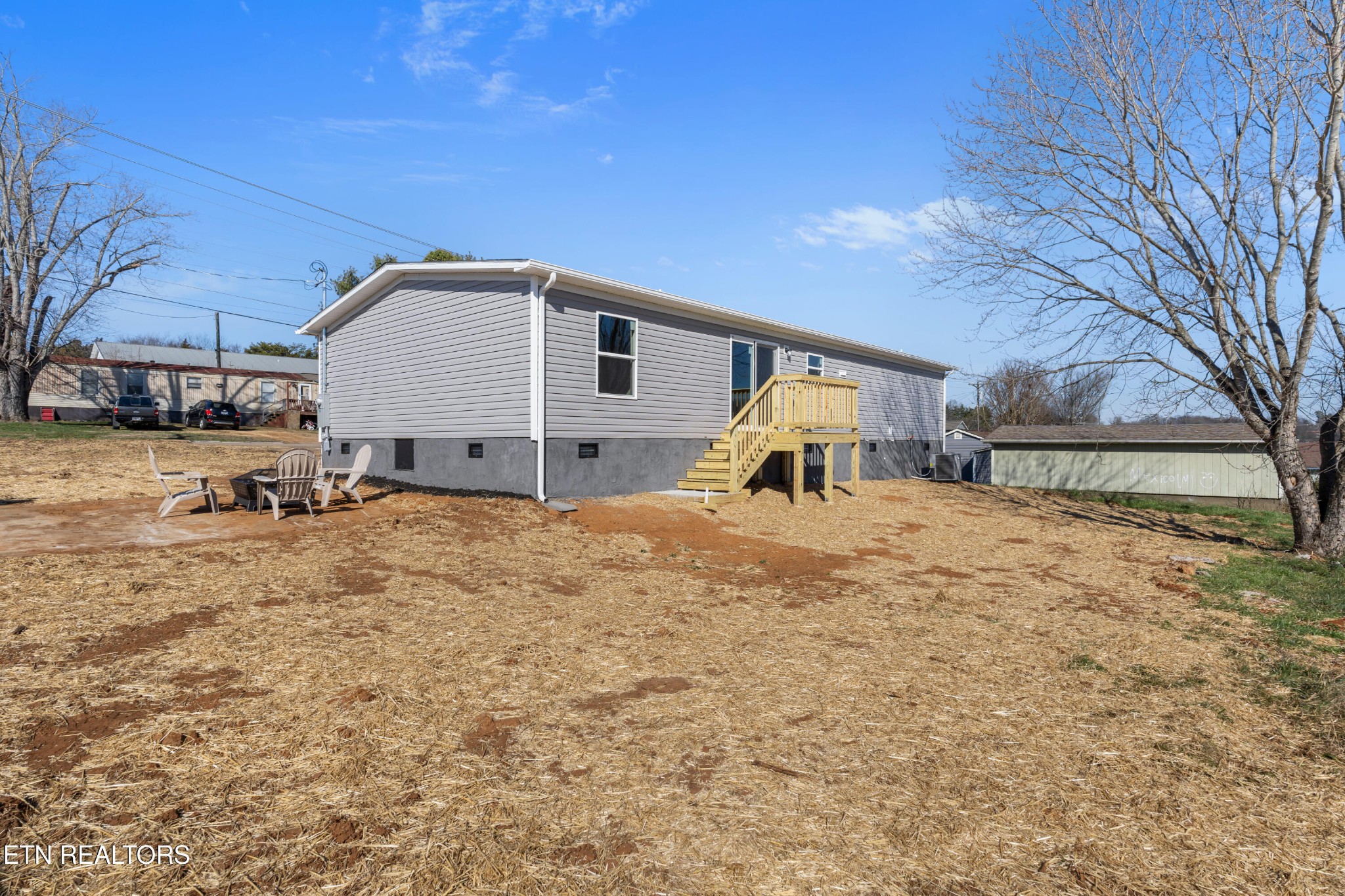 911 Summer Street Loudon, TN 37774 - Photo 25 of 25 a view of a house with a yard